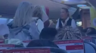 Uçağın tekeri piste değdiği gibi ayağa kalktılar, kabin memurları polis çağırdı