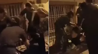 4 kadın sokakta oturan başka bir kadını darp edip elbiselerini soydu
