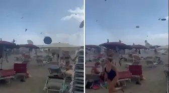 Hortum, plajı savaş alanına çevirdi: Turist canını zor kurtardı