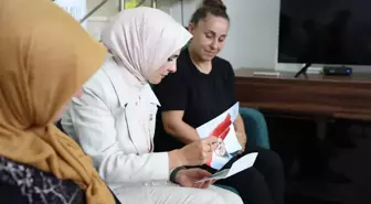 ŞEHİT AİLESİNE CUMHURBAŞKANI'NIN MEKTUBUNU İLETTİ