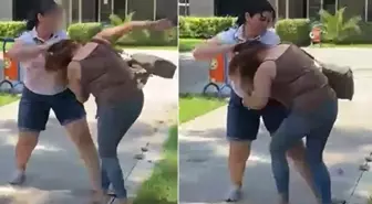 Kocasıyla birlikte bastığı kadını saçından sürükledi