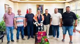 Burhaniye Deveciler Derneği Başkanı Kaymakam Atilla'yı Ziyaret Etti