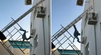 Sırtındaki klimayla birlikte metrelerce yükseklikten düştü