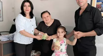 8 Yaşındaki Kız Cüzdanı Sahibine Teslim Etti