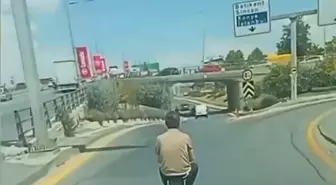 Elektrikli Skuterle Valiz Seyahati Trafikte Güvenlik Riski Yarattı