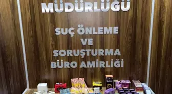 İzmir'de Kaçak Sigara ve Cinsel İçerikli İlaç Operasyonu