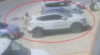 El freni çekilmeyen otomobili tek eliyle durdurdu