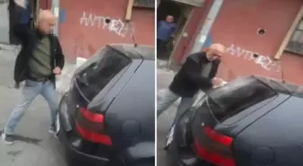 Alkollü şahıs, esnafın aracını taşla paramparça etti
