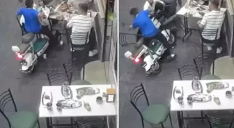 Elektrikli bisikletiyle, yemek yiyenlerin arasına daldı
