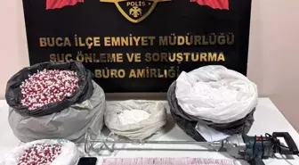 İzmir'de Uyuşturucu İmalatı Operasyonu: 10 Kilogram Toz ve 28 Bin Kapsül Ele Geçirildi