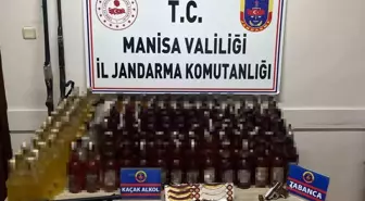 Manisa'da Jandarma Operasyonu: Yüzlerce Şişe Sahte İçki ve Silah Ele Geçirildi