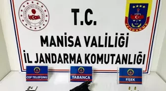 Manisa'da Jandarma, Şüpheli Kişinin Üzerinden Ruhsatsız Tabanca ve Mermi Çıkardı