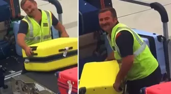 Bagaj yüklerken milyonların gönlünü kazandı