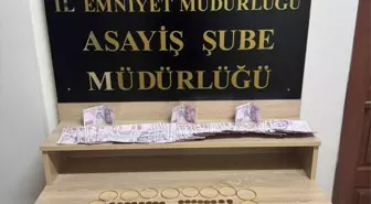 Aksaray'da polis olarak tanıttığı kişinin 5,5 milyon liralık ziynet eşyasını dolandıran şüpheli yakalandı