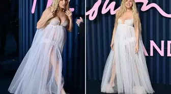 Ünlü oyuncu hamileliğini tül elbisesiyle kırmızı halıda duyurdu