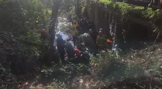 Bursa'da devrilen traktörün altında sıkışan sürücüyü ekipler kurtardı