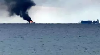 Kalkan açıklarında alev alan lüks teknedeki kaptan Sahil Güvenlik ekiplerince kurtarıldı