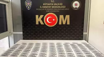 Kütahya'da KOM ekipleri sahte para operasyonunda kalpazanı yakaladı