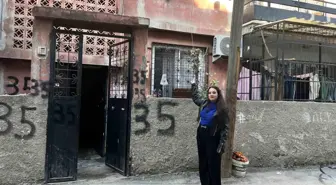 Kargoyu aracından inmeden bahçeye fırlattı