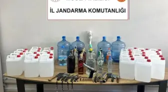 Milas'ta sahte içki ve silah ele geçirildi