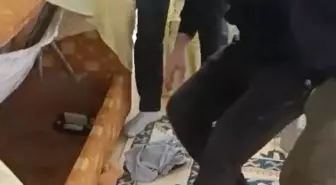 Aydın'da firari hükümlü, kanepenin altında saklanırken yakalandı