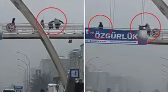 Üst geçitte kar topu atan çocukları yumruklayıp, yerde tekmeledi