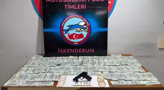 İskenderun'da Sahte 1 Milyon Dolar ve Ruhsatsız Tabanca Ele Geçirildi