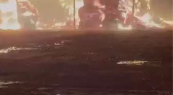 Unutulan ateşin közünden sıçrayan kıvılcımlar, çiftlikteki saman balyalarını yaktı