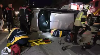 Devrilen otomobilin altında kalan sürücü itfaiye ekiplerince çıkarıldı
