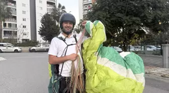 Mersin'de uçuş yapan paraşütçü orman işçilerinin çay daveti üzerine kırsal alana iniş yaptı