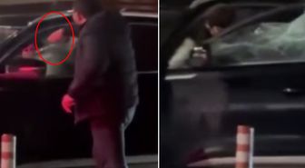 Kadının bulunduğu cipin ön camını yumrukla kırdı! Vatandaşlar film gibi izledi