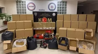 Manisa'da kaçak sigara ve silah operasyonu