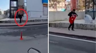 14 yaşındaki çocuk yerde gördüğü Türk bayrağını öperek kaldırdı