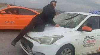 Sürücü kurusu eğitmeni, tartıştığı kişiyi kaput üzerinde 20 kilometre sürükledi
