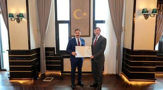 Vali Masatlı, Müftü Topçu'ya başarı belgesi verdi