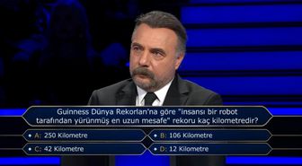 Guiness Dünya Rekorları’na göre insansı bir robot tarafından yürümüş en uzun mesafe rekoru kaç kilometredir?