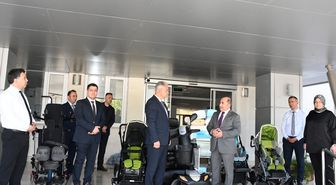 Antalya'da ihtiyaç sahiplerine engelli aracı ve bebek arabası bağışı yapıldı