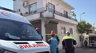 Efeler'de çöken balkondan düşen baba ve oğlu yaralandı