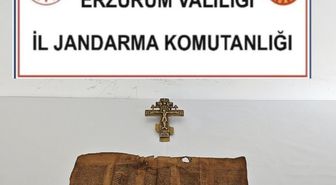 Erzurum'da Orta Çağ dönemine ait parşömen ve bronz haç ele geçirildi