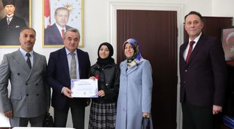 Bölge birincisi öğrenciye Kaymakam Öztürk'ten tebrik