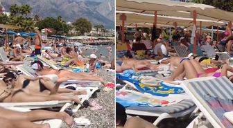 Antalya'da sıcak havayı gören Rus turistler plajlara akın etti