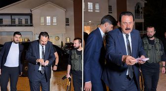 Ertoşi aşiretinin lideri İskender Ertuş aracından iner inmez deste deste para dağıttı