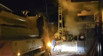 Yatalak hasta komşularının yardımıyla yangından kurtarıldı