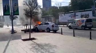 Mecidiyeköy'de benzin deposu sızan otomobilin el frenini çekmeyi unuttu, tabeleya çarpan araç alev alev yandı