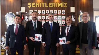 Bakan Yardımcısı Tarıkdaroğlu, Erzurum'da şehit aileleri ve gazilerle bayramlaştı