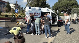 Efeler'de otomobille çarpışan motosikletin sürücüsü yaralandı