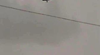 Askeri helikopter dolu ve yağmura yakalandı