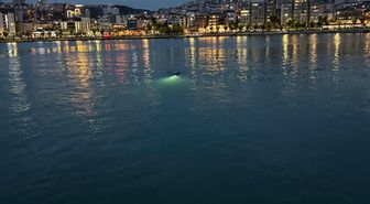 Ekipleri harekete geçiren deniz kıyısındaki eşyalar, profesyonel yüzücünün çıktı