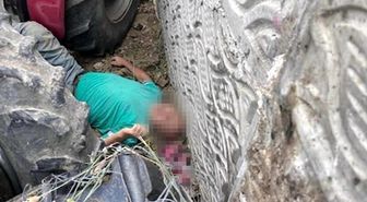 Kullandığı traktörün altında kalan çiftçi ağır yaralandı