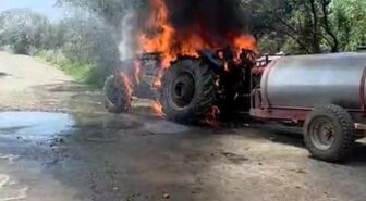 Alevlere teslim olan traktörde yaşanan patlama kameraya yansıdı